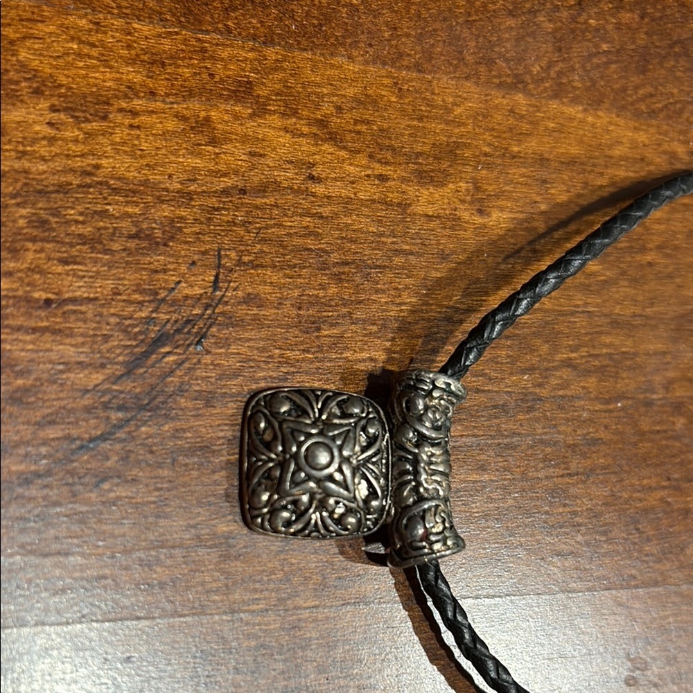 Silver Pendant on Black Braided Cord